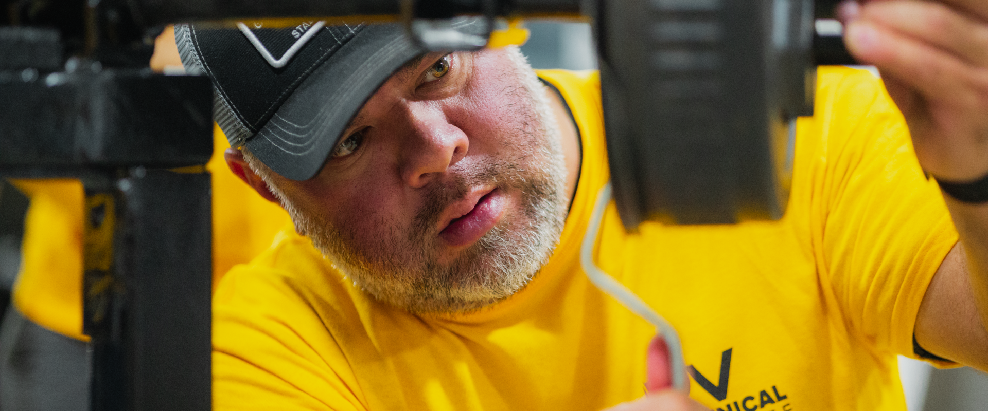 Technician working on axel