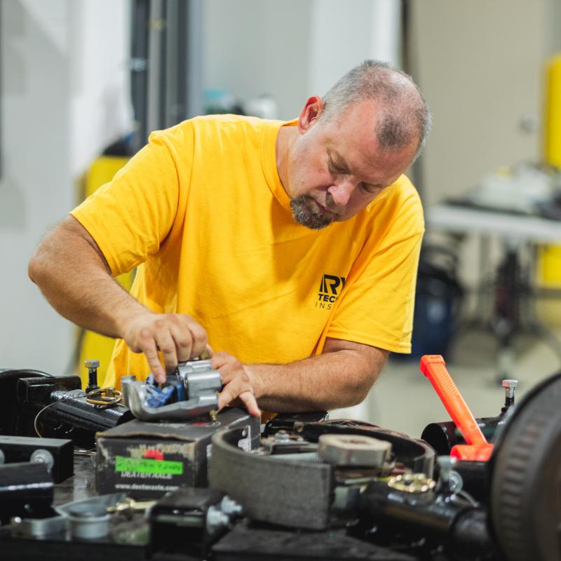 Technician working on tutorial axel